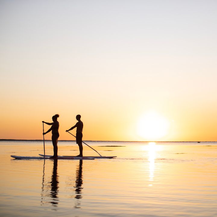 Paddle surf al atardecer